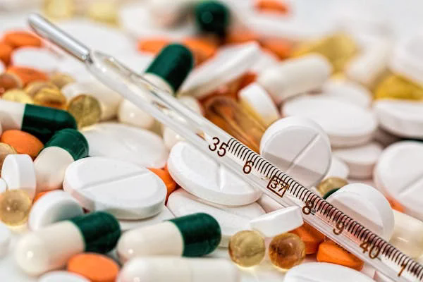 thermometer-headache-pain-pills-139398.webp